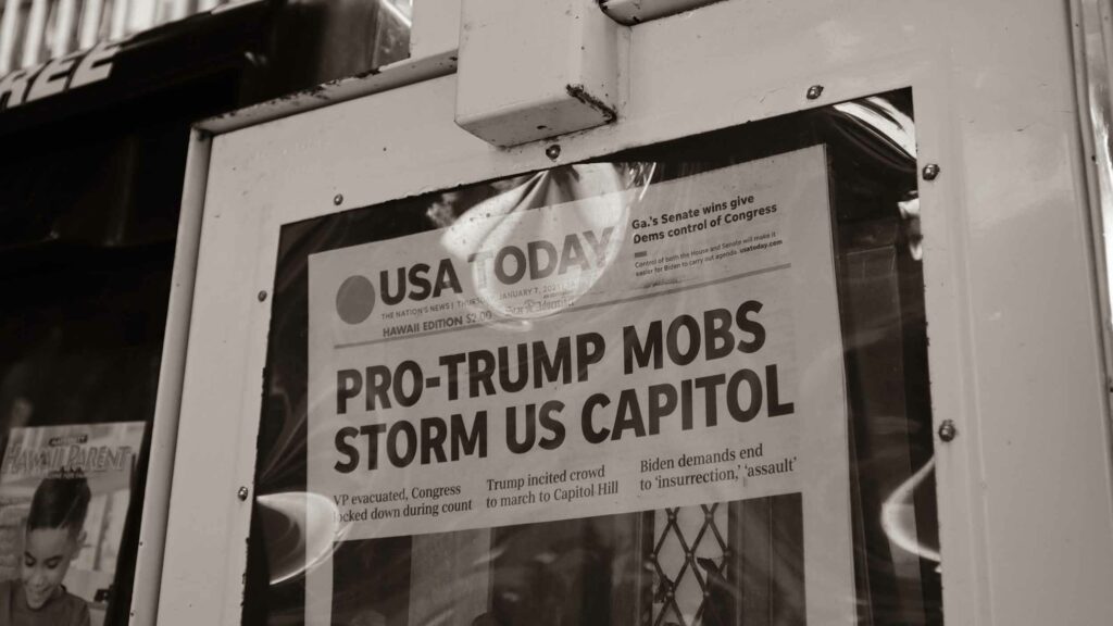 The January 7, 2021 front page of USA Today, with the headline "Pro-Trump Mobs Storm US Capitol"